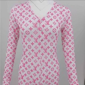 Pink and white designer onesie.